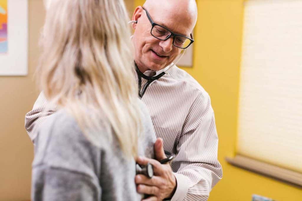 dr grajcar seeing patient in his office